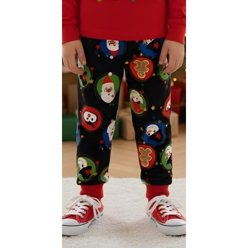 Детски панталон с празничен принт. Весело и празнично долнище с маншети.